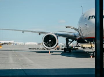 white airliner on runway